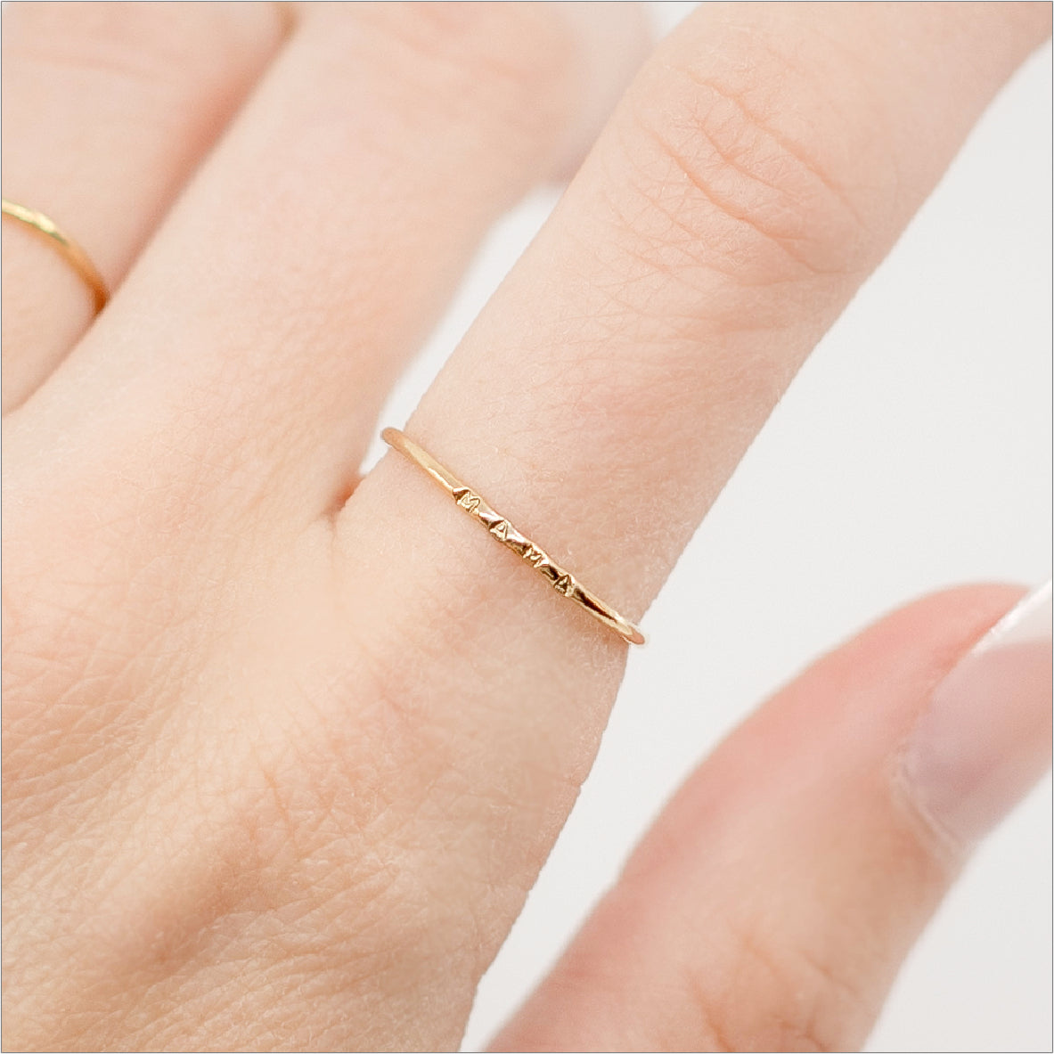 Mama Ring Modeled